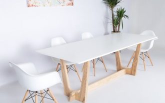 dining area, white flooring, white wall, white midcentury modern chairs, wooden legged table with white top, plants