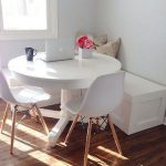 Dining Corner With White Corner Bench, White Round Table, White Mid Century Modern Chairs