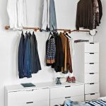 Open Closet In Six Different Rails, White Cabinets In L