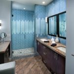 Shower Pan Tiles Blue Wall Tiles Mosaic Floor Tile Wooden Vanity Double Sink Wall Mirrors Wall Sconces Granite Top Towel Holder Glass Shower Door