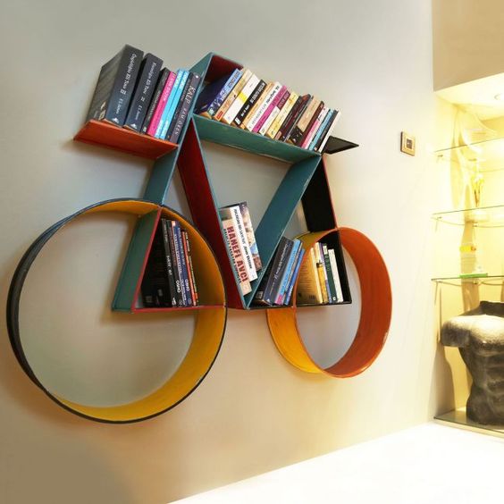 colorful floating shelves shaped like a bike