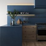 Kitchen, Wooden Floor, Wooden Cabinet With Blue Side And Top, Blue Backsplash With Floating Shelves And LED Lights, White Wall
