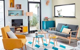 living room, grey seamless floor, white blue rug, round coffee table, soft blue yellow wall, grey sofa, yellow chair, floating box helves, wooden cabinet