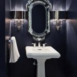 Powder Room, Navy Wall, White Marble Floor, White Sink, Silver Sconce, Silver Framed Mirror