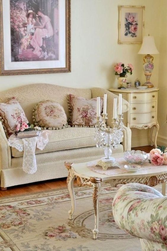 living room, wooden floor, beige sofa, white coffee table with detailed, flower chair, white side table, white table lamp