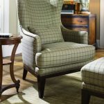 White Plaid Chair With Black Lines, Ottoman, Green Rug, Wooden Side Table, Wooden Cabinet