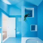 Bathroom, Blue Square Floor And Wall Tiles, White Tub, Blue Wall, Blue Ceiling, White Hole For Plants, White Door