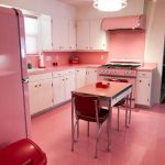 Kitchen, Pink Floor, Pink Backsplash Wall, White Cabinet, Pink Fridge, Pink Dining Table, Red Chair