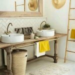 Wooden Vanity Table, White Wall, White Herringbone Backsplash Tiles, Bamboo Rack, Rattan Basket, White Wooden Floor
