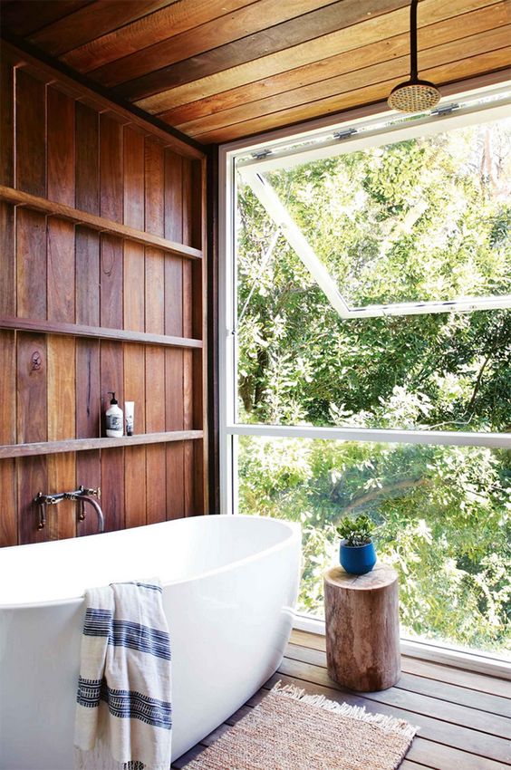 bathroom, wooden wall, wooden ceiling, wooden floor, white tub, large glass window