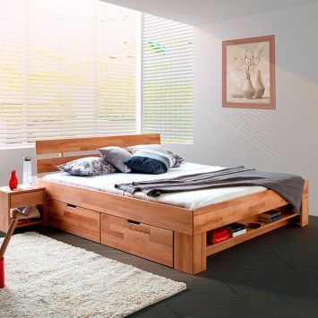 bed platform, wooden material, black floor, grey wood, cream rug, white bedding