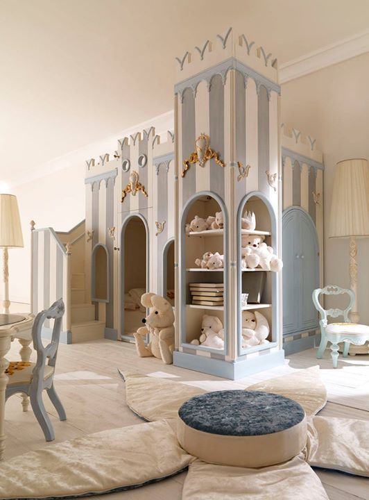 kids room, wooden floor, cream wall, blue cream  castle with shelves, flower table cushion, blue low chairs