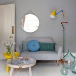 Grey Wall, White Wooden Floor, Tray Coffee Tables, Colorful Floor Lamp, Grey Sofa, Round Mirror, Glass