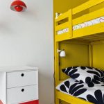 Kid Room, White Floor, White Wall, Yellow Bunk Bed, White Cabinet, Red Cabinet, Red Sconce