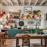 Kitchen, Wooden Floor, White Exposed Brick Wall, Green Cabinet, Wooden Floating Shelves, Wooden Table, Wooden Stool,