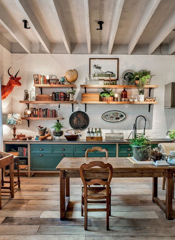 kitchen, wooden floor, white exposed brick wall, green cabinet, wooden floating shelves, wooden table, wooden stool,